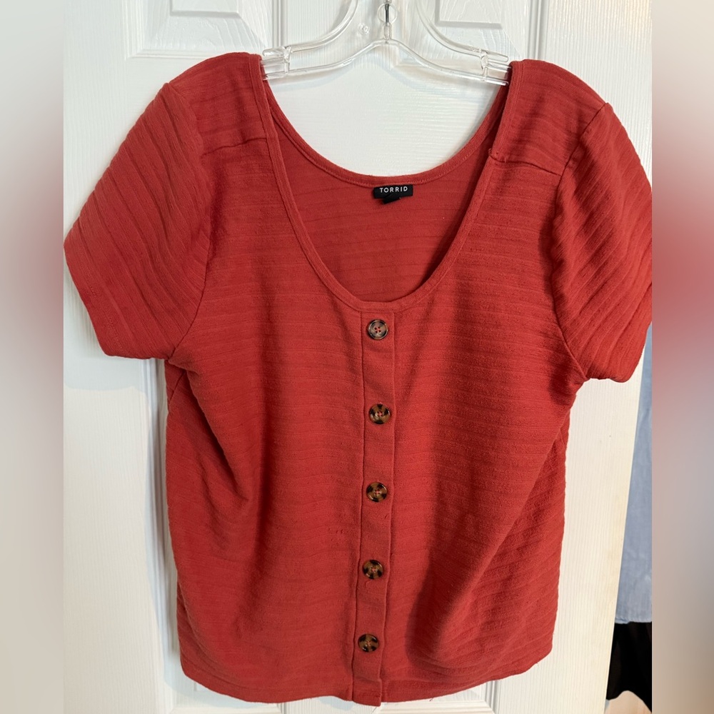 Cropped pink/orange top.